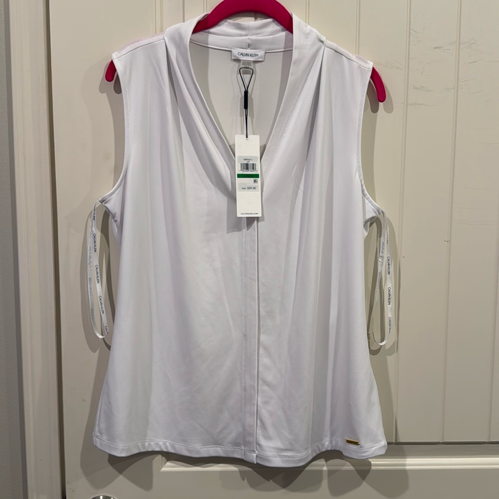 Brand new condition Calvin Klein large suit blouse.